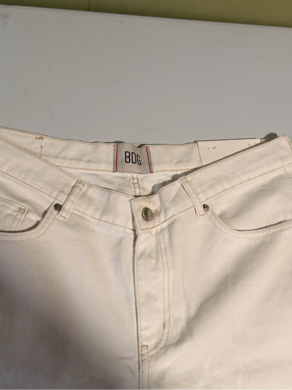 BDG White Denim Jeans with Red Stitch Detail
